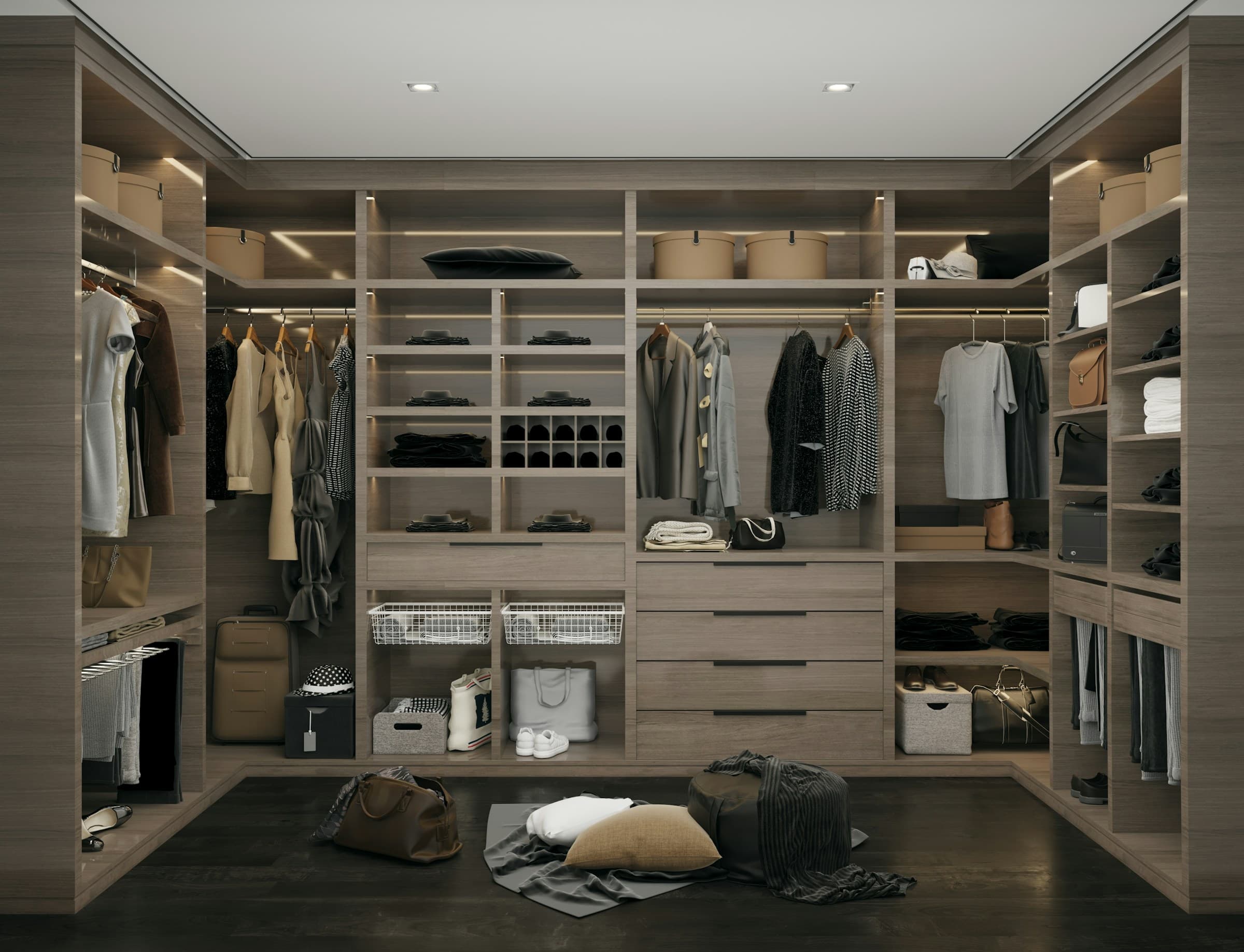 Large warm-wood custom walk-in closet with drawers, shoe cubbies, and LED lighting